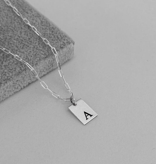 Collar Placa Inicial Varón